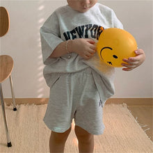 Load image into Gallery viewer, 24D154TG- Korean version ins boys and girls summer new suits cotton letter short-sleeved shorts casual loose children's two-piece suit